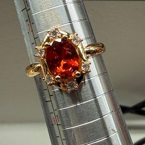Radiant Gold Plated Ring with Fiery Gemstone
